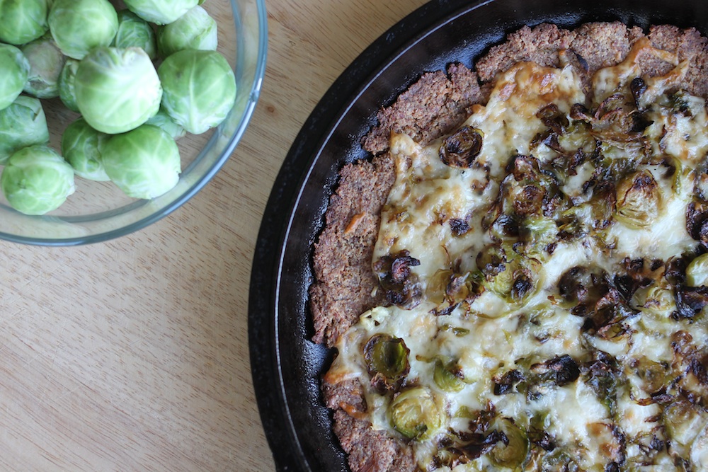 cauliflower crust pizza with brussels sprouts